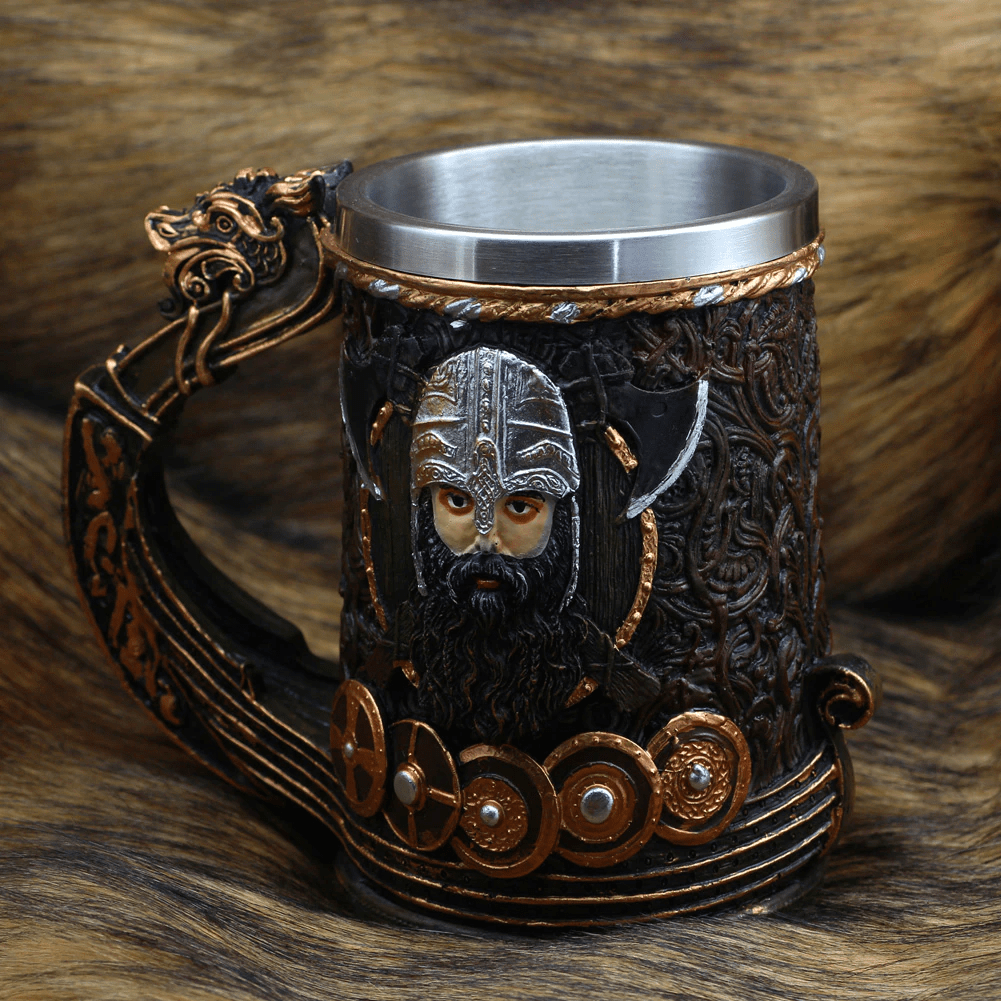 https://www.vikingsroar.com/cdn/shop/products/viking-drakar-stainless-steel-beer-mug-28535719264421_1600x.png?v=1617579742